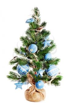 Christmas fir tree decorated with toys and Christmas decorations isolated on white background