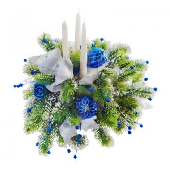 Christmas arrangement of Christmas balls, snowflakes, candles , beads and pine branches isolated on white background.