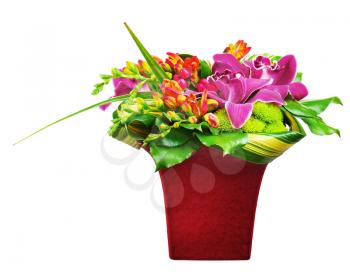 Colorful flower bouquet arrangement centerpiece in vase isolated on white background. Closeup.