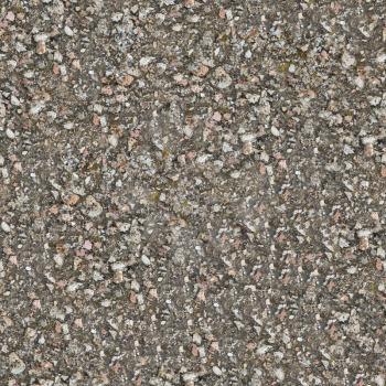 Seamless Texture of Weathered Old Concrete Surface with Protruding Stones and Spots of Moss.