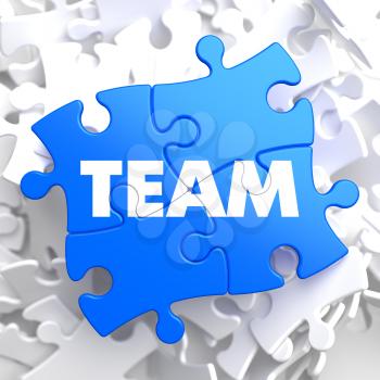 Team Written on Blue Puzzle Pieces. Business Concept.  3D Render.