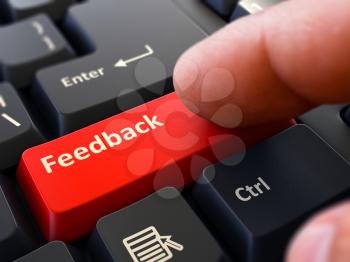 Feedback Button. Male Finger Clicks on Red Button on Black Keyboard. Closeup View. Blurred Background. 3d Render.