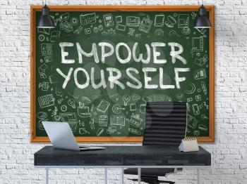 Empower Yourself - Handwritten Inscription by Chalk on Green Chalkboard with Doodle Icons Around. Business Concept in the Interior of a Modern Office on the White Brick Wall Background. 3D.