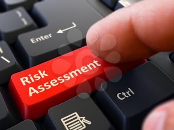 Risk Assessment - Written on Red Keyboard Key. Male Hand Presses Button on Black PC Keyboard. Closeup View. Blurred Background. 3D Render.