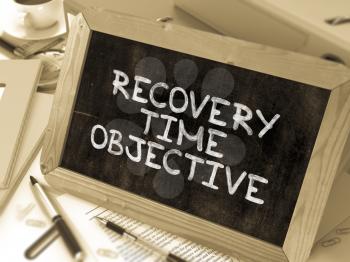 Hand Drawn Recovery Time Objective Concept  on Chalkboard. Blurred Background. Toned Image. 3D Render.