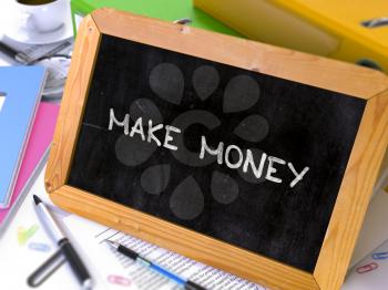 Make Money Concept Hand Drawn on Chalkboard on Working Table Background. Blurred Background. Toned Image. 3D Render.