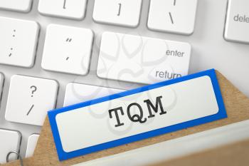 TQM written on Blue Folder Index on Background of White Modern Computer Keypad. Business Concept. Closeup View. Blurred Illustration. 3D Rendering.
