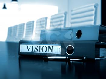 File Folder with Inscription Vision on Wooden Black Table. Vision - Business Concept on Toned Background. 3D.