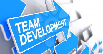 Team Development - Blue Arrow with a Label Indicates the Direction of Movement. Team Development, Inscription on the Blue Pointer. 3D Illustration.
