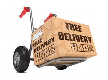 Cardboard Box with Free Delivery Slogan on Hand Truck White Background.