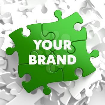 Your Brand on Green Puzzle on White Background.