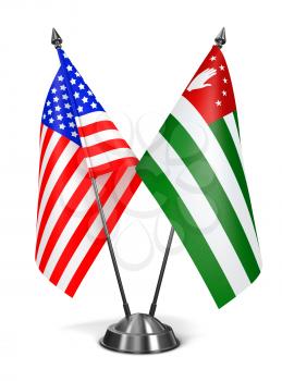 USA and Abkhazia - Miniature Flags Isolated on White Background.