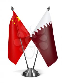 China and Qatar - Miniature Flags Isolated on White Background.