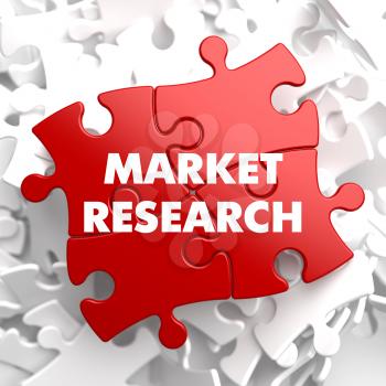 Royalty Free Clipart Image of Market Research Text on Puzzle Pieces