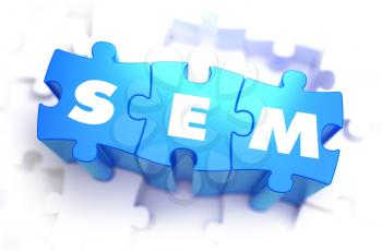 SEM - Text on Blue Puzzles on White Background. 3D Render. 