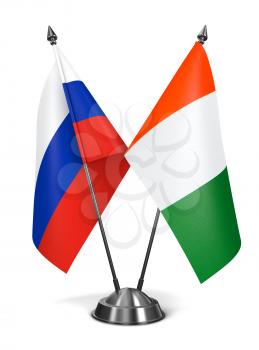 Russia and  Ivory Coast - Miniature Flags Isolated on White Background.