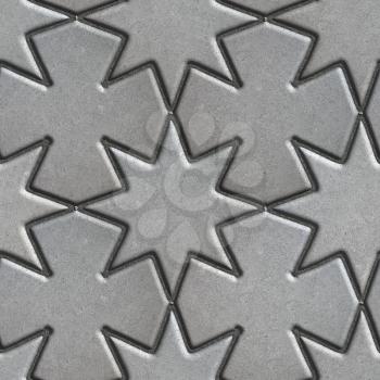 Gray Paving Slabs Laid in the Form of Stars and Crosses. Seamless Tileable Texture.