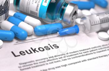 Leukosis - Printed Diagnosis with Blurred Text. On Background of Medicaments Composition - Blue Pills, Injections and Syringe.