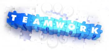 Teamwork - White Word on Blue Puzzles on White Background. 3D Illustration.