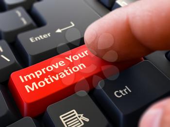 Improve Your Motivation Button. Male Finger Clicks on Red Button on Black Keyboard. Closeup View. Blurred Background.