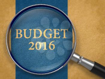 Budget 2016 Concept through Magnifier on Old Paper with Dark Blue Vertical Line Background. 3d Render.