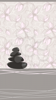 Spa background of black pebble decorated with flowers