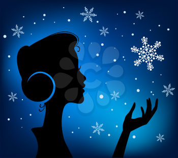 Christmas Eve background. Profile Silhouette of Pretty Young Girl Listening to Song Melody in Headphones with Snowflake in her Hand. Image May Be Use as Postcard or Placard