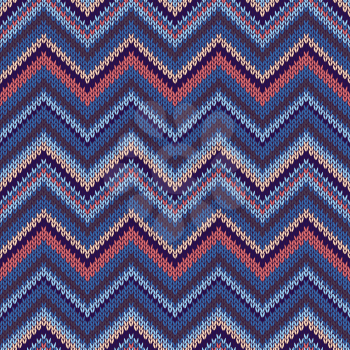 Seamless geometric ethnic spokes knitted pattern. Blue white orange beige color knitwear sample