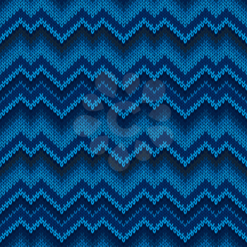 Seamless knitted pattern in blue. Zigzag embroidery