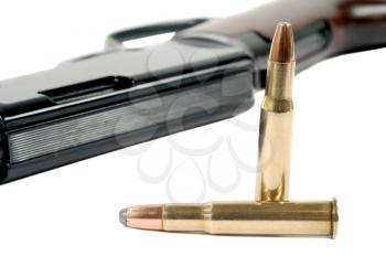 Royalty Free Photo of Two Bullets and a Rifle