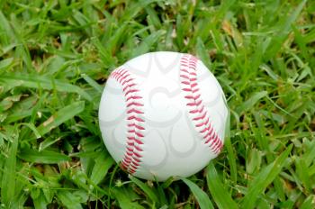 Royalty Free Photo of a Baseball on Grass