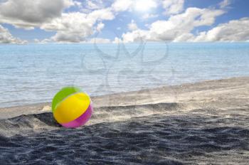 Royalty Free Photo of a Beach Ball on a Deserted Beach