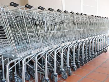 Supermarket carts parked outside the building