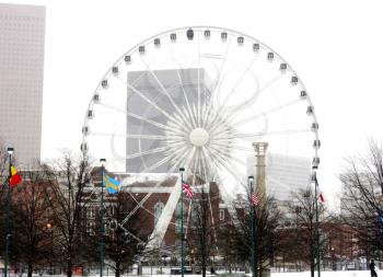 Huge ferris wheel at Centennial  Olympic Park in Atlanta Georgia during a snow storm