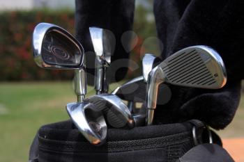 Close up of a golf bag and clubs
