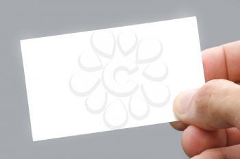 hand holding a business card isolated on a white background