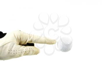 Hand with glove pointing to a golf ball isolated on white