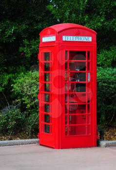  Red british  phone booths  at a street