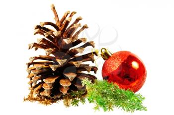 Christmas tree ball and pine cone isolated on white