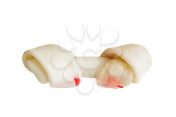 Macro shot of a rawhide dog bone isolated on white