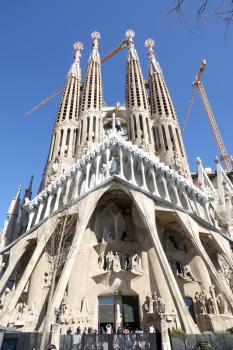 BARCELONA-SPAIN-FEB 22, 2019:  Basílica y Templo Expiatorio de la Sagrada Familia; is a large unfinished Roman Catholic church in Barcelona, designed by Catalan architect Antoni Gaudí. Gaudí's work on the building is part of a UNESCO World Heritage Site