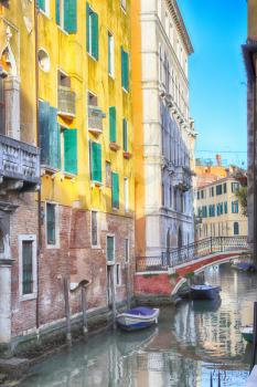  canal in Venice, Italy, with boats in the foreground