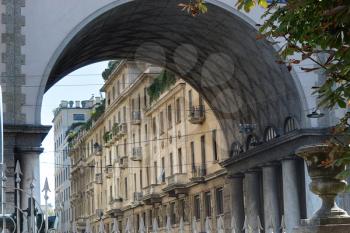ancient arch and forged fence  in Milan