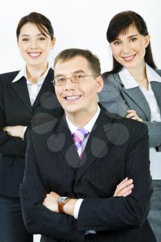 Vertical photo of business team with confident leader at the front