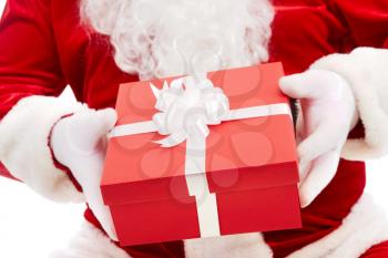 Photo of Santa Claus hands holding red giftbox