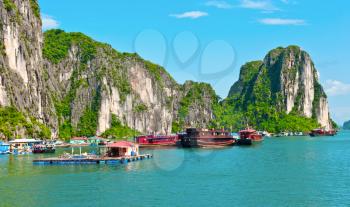 Floating village and boats in Halong Bay, Vietnam, Southeast Asia