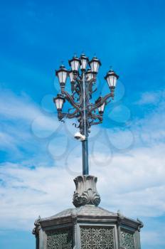 Vintage street lantern on blue sky background, Moscow, Russia, East Europe