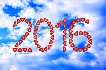 New Year 2016 made from hearts on sky background