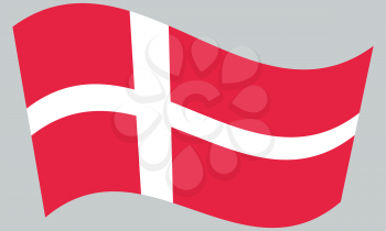 Flag of Denmark waving on gray background