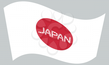 Japanese flag waving with word Japan on gray background